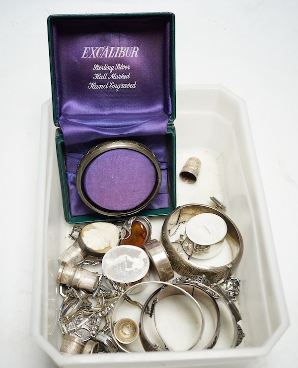 A collection of white metal and hallmarked silver jewellery, trinket boxes and thimbles. Condition - fair